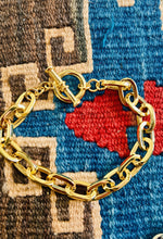 Equestrian Gold And Silver Bracelets