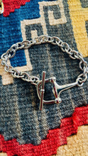 Equestrian Gold And Silver Bracelets